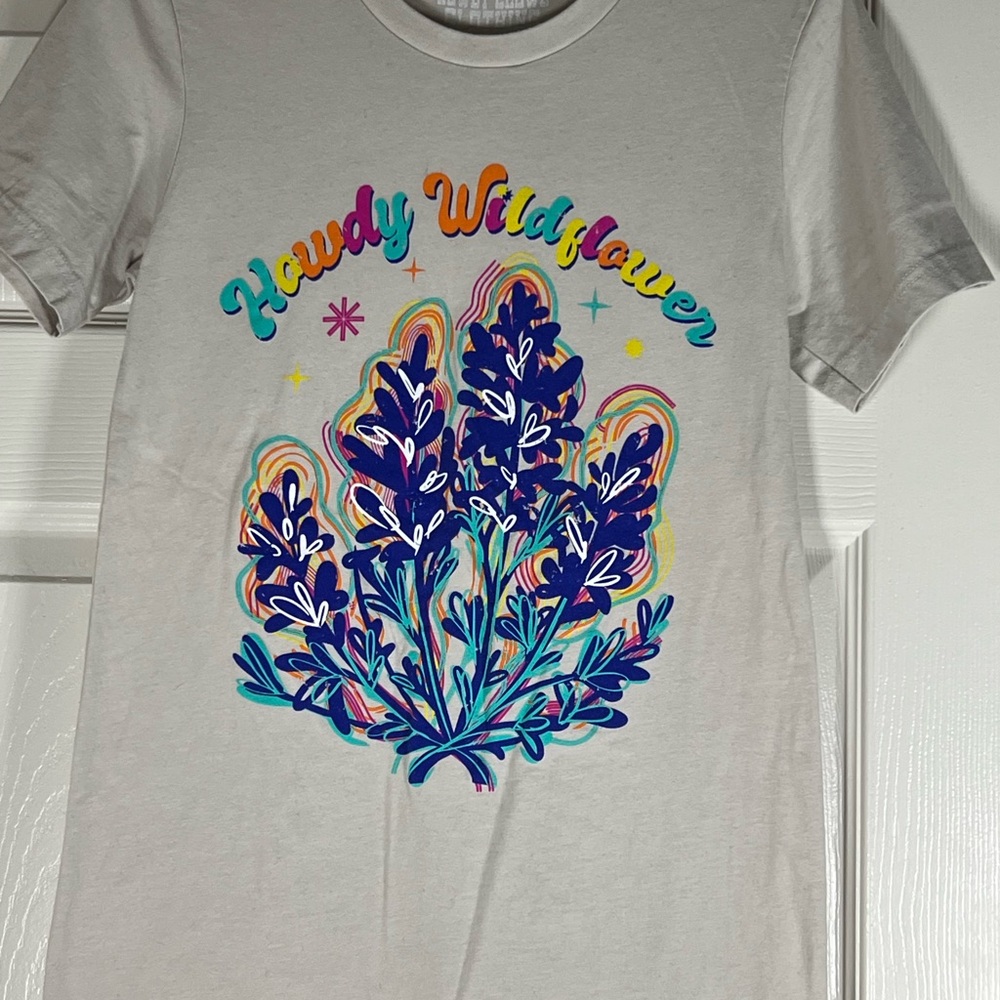 White and Blue Short Sleeve Tee with Vibrant Designs